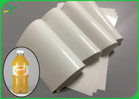 กระจกสีขาวเคลือบ 1 ด้าน 80 แกรม 90 แกรมกระดาษเคลือบโครเมียมเพื่อฉลากขวดน้ำผลไม้